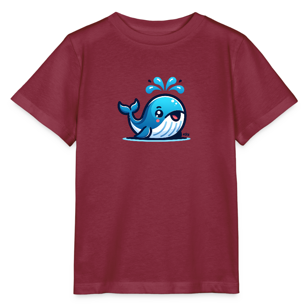 Onlineshop Shirts für Kinder - Das Bild zeigt ein rotes Kinder-T-Shirt mit einem farbenfrohen und niedlichen Walfisch-Motiv auf der Vorderseite. Der Walfisch ist in Blautönen gehalten und spritzt fröhlich Wasser nach oben. Die Grafik vermittelt eine verspielte und fröhliche Stimmung, die bei Kindern gut ankommen könnte. Das T-Shirt hat kurze Ärmel und einen klassischen Schnitt, ideal für den Alltag.