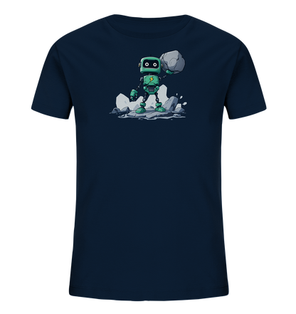 Onlineshop Shirts für Kinder - Das Bild zeigt ein dunkelblaues Kinder-T-Shirt mit einem Aufdruck auf der Vorderseite. Der Aufdruck stellt einen robusten, türkisfarbenen Roboter dar, der auf einem Haufen grauer Felsen steht. Der Roboter hält mit einer Hand einen großen, ebenfalls grauen Stein über seinem Kopf. Auf der Brust des Roboters ist ein gelbes Blitzsymbol zu sehen, was auf Energie oder Stärke hindeutet. Die Szene wirkt dynamisch und vermittelt einen Eindruck von Kraft und Abenteuer.