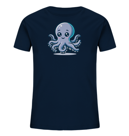 Onlineshop Shirts fuer Kinder - Das Bild zeigt ein dunkelblaues Kinder-T-Shirt mit einem bezaubernden Oktopus-Motiv. Der Oktopus ist in einem freundlichen Cartoon-Stil gestaltet, hat grosse Augen, rosa Wangen und sitzt auf einer hellen Flaeche. Seine acht Tentakel sind sichtbar, und ein leichter Glanz umgibt seinen Kopf. Das Design verleiht dem Shirt einen verspielten und froehlichen Meeres-Look.