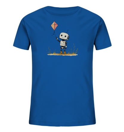 Onlineshop Shirts für Kinder - Das Bild zeigt ein leuchtend blaues Kinder-T-Shirt. Auf der Vorderseite ist eine niedliche Grafik eines kleinen, lächelnden Roboters abgebildet. Der Roboter hält einen orangefarbenen Drachen an einer Schnur fest. Er steht auf einem Bereich, der Gras und trockene Pflanzen darstellt, was dem Motiv eine natürliche Note verleiht.