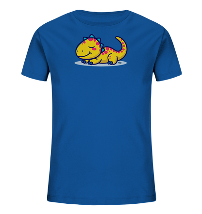 Onlineshop Shirts fuer Kinder - Das Bild zeigt ein koenigsblaues Kinder-T-Shirt mit einem niedlichen gelben Dinosaurier-Motiv auf der Vorderseite. Der Cartoon-Dinosaurier liegt entspannt da, hat rosa Flecken und blaue Zacken auf dem Ruecken und laechelt mit geschlossenen Augen. Das Design ist farbenfroh und vermittelt einen froehlichen, verspielten Eindruck.