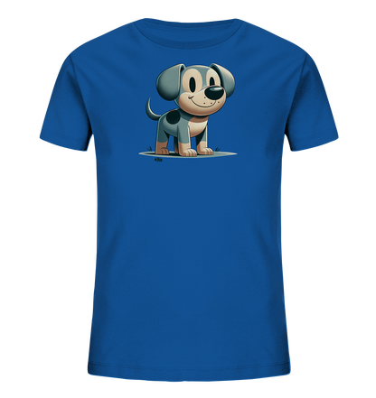 Onlineshop Shirts fuer Kinder - Dieses blaue T-Shirt fuer Kinder zeigt eine niedliche, cartoonhafte Illustration eines Hundes auf der Vorderseite. Der Hund hat graues Fell mit dunkleren Flecken, grosse Ohren und ein breites Laecheln. Er steht auf einer kleinen Grasflaeche und blickt nach vorne. Das Design ist freundlich und ansprechend gestaltet.