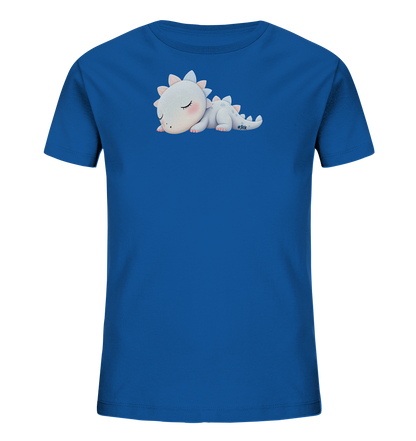 Onlineshop Shirts fuer Kinder - Das Bild zeigt ein blaues Kinder-T-Shirt. Es ist mit einem niedlichen, hellen Kreaturmotiv verziert, das wie ein schlafender Baby-Drache oder Dinosaurier aussieht. Die Figur hat rosige Wangen und kleine, zarte Stacheln in Pastellfarben auf Kopf und Ruecken. Dieses sanfte und traeumerische Design eignet sich ideal fuer Kindermode.