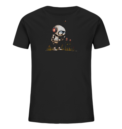 Onlineshop Shirts für Kinder - Dieses Bild zeigt ein schwarzes Kinder-T-Shirt, das auf der Vorderseite mit einer Grafik bedruckt ist. Die Illustration zeigt einen kleinen, niedlichen Roboter in einem Feld mit wenigen, stilisierten Blumen und Grashalmen. Der Roboter ist hellgrau mit einigen farbigen Akzenten wie roten Augen und blauen Details. Er steht inmitten der einfachen Vegetation und scheint sich mit den Blumen zu beschäftigen. Die neutrale Darstellung des Motivs ist für Kinder ansprechend gestaltet.