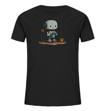 Onlineshop Shirts für Kinder - Das Bild zeigt ein schlichtes, schwarzes T-Shirt für Kinder mit einem aufgedruckten Motiv. Im Zentrum des Designs ist ein niedlicher, cartoonartiger Roboter in Grau abgebildet. Der Roboter hält eine blaue Gießkanne und scheint zwei Pflanzen zu gießen: eine orangefarbene Blume und eine junge Pflanze in einem Topf. Die Szene spielt sich auf einem Stück Erde ab und verleiht dem Shirt ein freundliches, naturverbundenes Thema.