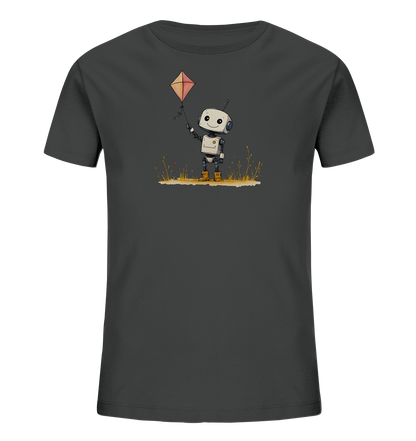 Onlineshop Shirts für Kinder - Das Bild zeigt ein dunkelgraues T-Shirt, das speziell für Kinder gedacht ist. Auf der Vorderseite befindet sich eine bezaubernde Illustration eines kleinen, lächelnden Roboters. Der Roboter steht in einer stilisierten Wiese mit braunem und gelbem Gras und hält die Leine eines farbigen Drachens, der in der Luft schwebt. Die Gesamtgestaltung wirkt freundlich und verspielt, ideal für ein Kinderoutfit.