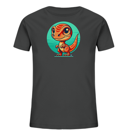 Onlineshop Shirts fuer Kinder - Das Bild zeigt ein dunkelgraues Kinder-T-Shirt. Auf der Vorderseite ist eine Grafik eines orangefarbenen Cartoon-Dinosauriers mit roten Streifen und grossen Augen abgebildet. Der Dinosaurier steht in einem runden, tuerkisfarbenen Kreis auf einem braunen Untergrund. Das Motiv ist niedlich und ansprechend gestaltet.