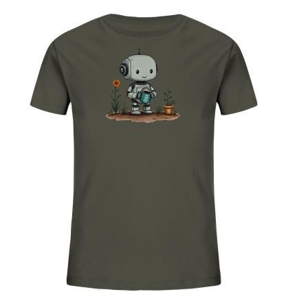 Onlineshop Shirts für Kinder - Das Bild zeigt ein Kinder-T-Shirt in einem dunklen Grau- oder Khakiton. Auf der Vorderseite ist eine Illustration eines niedlichen, freundlichen Roboters zu sehen. Der Roboter steht auf einem Stück Erde und hält eine kleine Gießkanne. Neben ihm wachsen eine Pflanze in einem Topf und eine weitere mit einer orangefarbenen Blüte.