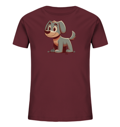 Onlineshop Shirts fuer Kinder - Das Bild zeigt ein dunkelrotes T-Shirt fuer Kinder mit einem niedlichen Cartoon-Hund auf der Vorderseite. Der Hund ist grau mit hellem Bauch, sitzt in einer freundlichen Pose und hat grosse, ausdrucksstarke Augen. Er laechelt und sein Schwanz wedelt leicht, dargestellt auf einem kleinen Stueck Gras. Das Design wirkt verspielt und ansprechend fuer Kinder.