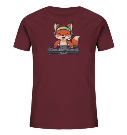 Onlineshop Shirts fuer Kinder - Das Bild zeigt ein dunkelrotes Kinder-T-Shirt mit einem verspielten Aufdruck auf der Vorderseite. Zu sehen ist ein freundlicher, cartoonhafter Fuchs, der Kopfhoerer traegt und hinter einem DJ-Mischpult steht. Der Fuchs lacht mit geschlossenen Augen und leicht herausgestreckter Zunge, was dem Design eine froehliche Ausstrahlung verleiht. Die Grafik ist farbenfroh und detailreich gestaltet.