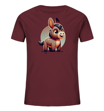 Onlineshop Shirts fuer Kinder - Das Bild zeigt ein Kinder-T-Shirt in einem warmen, dunkelroten Farbton. Auf der Vorderseite ist die Illustration eines kleinen, freundlich laechelnden Esels zu sehen. Der Esel ist im Cartoon-Stil gezeichnet und steht vor einem hellen Kreis als Hintergrundelement. Das Design wirkt verspielt und ansprechend fuer Kinder.