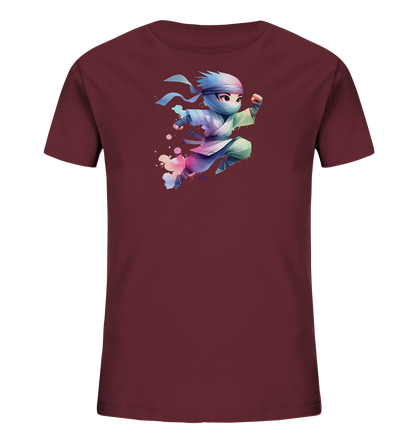 Onlineshop Shirts fuer Kinder - Das Bild zeigt ein dunkelrotes T-Shirt. Auf der Vorderseite befindet sich eine bunte Illustration eines Charakters in einer springenden Pose. Die Darstellung nutzt einen kuenstlerischen Stil mit Farbverlaeufen und Spritzern.