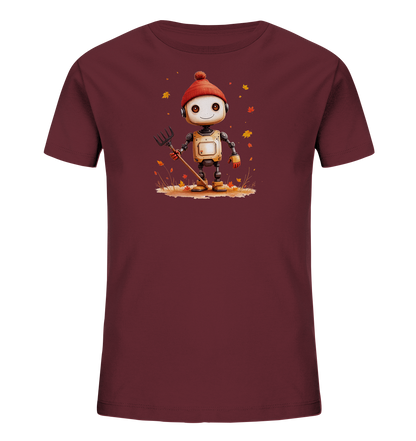 Onlineshop Shirts für Kinder - Das Bild zeigt ein dunkelrotes T-Shirt mit einem herbstlichen Motiv auf der Vorderseite. Im Zentrum des Designs steht ein freundlicher, cartoonartiger Roboter, der eine rote Bommelmütze trägt und einen Rechen hält. Der Roboter ist von fallenden Herbstblättern in warmen Farbtönen umgeben und steht auf einem kleinen Fleckchen Gras und Erde. Das gesamte Motiv vermittelt eine fröhliche Herbststimmung.
