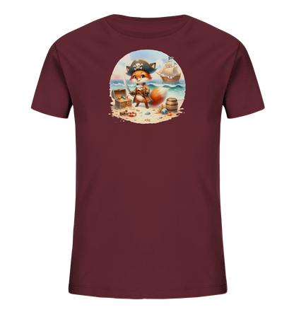 Onlineshop Shirts fuer Kinder - Das Bild zeigt ein dunkelrotes T-Shirt mit einem ovalen Druck auf der Vorderseite. Der Druck zeigt eine Illustration eines anthropomorphen Fuchses, der als Pirat verkleidet an einem Strand steht. Im Hintergrund sind eine Schatztruhe, ein Fass und ein Segelschiff auf dem Meer zu sehen. Das Design ist detailliert und farbenfroh.