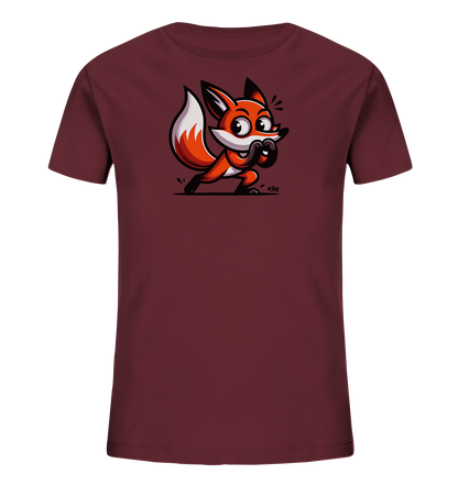 Onlineshop Shirts fuer Kinder - Das Bild zeigt ein bordeauxrotes Kinder-T-Shirt. Auf der Vorderseite befindet sich eine niedliche, cartoonhafte Illustration eines Fuchses. Der Fuchs ist orange und weiss gezeichnet und hat einen verspielten, ueberraschten Gesichtsausdruck. Er ist in einer dynamischen, kauernden Pose dargestellt, was dem Design einen lebendigen Charakter verleiht.