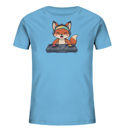 Onlineshop Shirts fuer Kinder - Das Bild zeigt ein hellblaues Kinder-T-Shirt mit einem lebhaften Motiv eines laechelnden Fuchses auf der Vorderseite. Der Fuchs traegt bunte Kopfhoerer und steht hinter einem detaillierten DJ-Mischpult mit zwei Plattenspielern. Die Darstellung verleiht dem Shirt einen froehlichen und musikalischen Charakter.