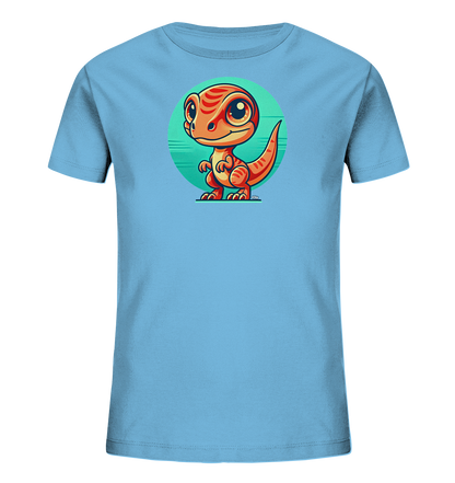 Onlineshop Shirts fuer Kinder - Dieses hellblaue Kinder-T-Shirt zeigt ein niedliches Cartoon-Motiv eines orangefarbenen Dinosauriers. Der freundlich laechelnde Dino mit grossen Augen steht vor einem tuerkisfarbenen Kreis. Das verspielte Design ist ideal fuer kleine Dino-Fans.