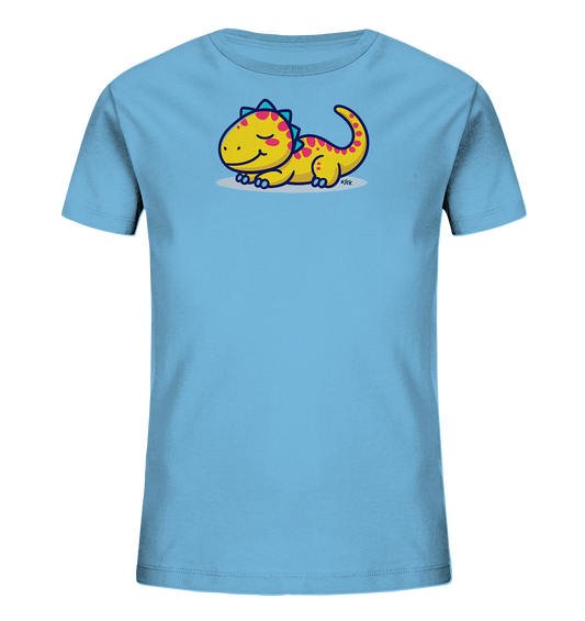 Onlineshop Shirts fuer Kinder - Das Bild zeigt ein hellblaues Kinder-T-Shirt mit einem niedlichen Cartoon-Dinosaurier auf der Vorderseite. Der Dino ist gelb mit pinkfarbenen Punkten und blauen Stacheln am Ruecken. Er liegt entspannt da, hat die Augen geschlossen und ein breites Laecheln. Das Design wirkt freundlich und verspielt.