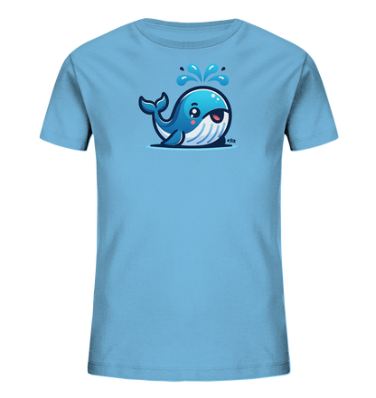 Onlineshop Shirts fuer Kinder - Das Bild zeigt ein hellblaues Kinder-T-Shirt mit einem niedlichen Cartoon-Wal. Der freundliche Wal ist in Blau- und Weisstoenen gestaltet und spritzt Wasser nach oben. Die Illustration verleiht dem Shirt einen froehlichen, maritimen Look.