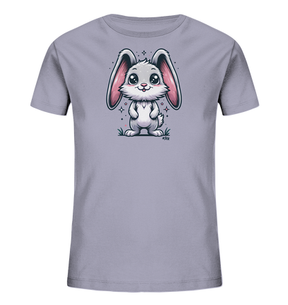 Onlineshop Shirts fuer Kinder - Das Bild zeigt ein Kinder-T-Shirt in einem hellen Grauton. Auf der Vorderseite ist eine niedliche Cartoon-Illustration eines Hasen zu sehen. Der Hase hat grosse Ohren, freundliche Augen und ist von funkelnden Sternen umgeben. Das Design wirkt verspielt und ansprechend fuer Kinder.