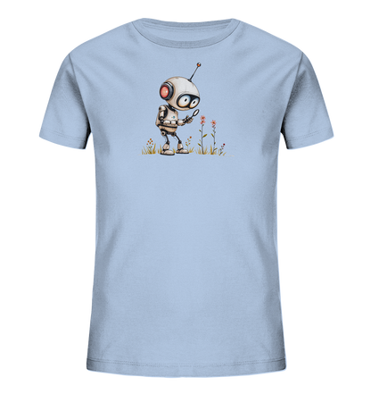 Onlineshop Shirts für Kinder - Das Bild zeigt ein hellblaues Kinder-T-Shirt mit einem detailreichen Aufdruck auf der Vorderseite. Der Aufdruck zeigt einen kleinen, freundlich aussehenden Roboter mit roten Akzenten. Der Roboter steht im Gras und betrachtet mit einer Lupe aufmerksam einige kleine Blumen. Das Design wirkt neutral und passt gut zu einem naturwissenschaftlich oder technisch interessierten Kind.