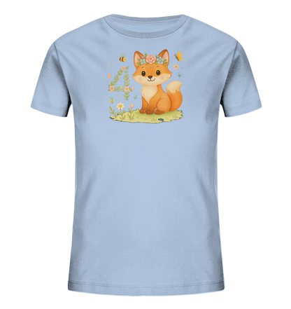 Onlineshop Shirts fuer Kinder - Das Bild zeigt ein hellblaues Kinder-T-Shirt mit einem freundlichen Fuchsmotiv. Ein suesser Fuchs mit Blumenkranz sitzt auf einer Wiese, umgeben von Blumen und Insekten. Links vom Fuchs ist die Zahl '4' kunstvoll aus floralen Elementen gestaltet. Das Design wirkt froehlich und detailreich.