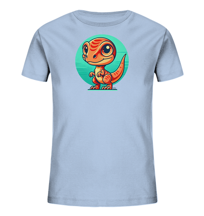Onlineshop Shirts fuer Kinder - Das Bild zeigt ein hellblaues Kinder-T-Shirt mit einem niedlichen Comic-Dinosaurier auf der Vorderseite. Der orangefarbene Dinosaurier mit grossen Augen und roten Streifen steht vor einem tuerkisfarbenen Kreis. Die Illustration ist farbenfroh und kindgerecht gestaltet. Das T-Shirt ist schlicht und dient als Hintergrund fuer das Motiv.