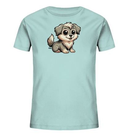 Onlineshop Shirts fuer Kinder - Das Bild zeigt ein hellblaues Kinder T-Shirt mit einem niedlichen Cartoon-Hund auf der Vorderseite. Der kleine Hund hat grau-weisses Fell, grosse Kulleraugen und ein freundliches Laecheln. Die Illustration ist detailliert gestaltet und gibt dem Shirt einen verspielten Charakter. Es ist ein ansprechendes Motiv fuer Kinderbekleidung.