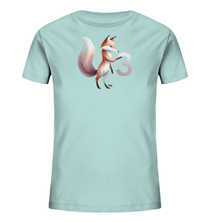 Onlineshop Shirts fuer Kinder - Das Bild zeigt ein hellblaues T-Shirt mit einem niedlichen Aufdruck eines Fuchses. Der Fuchs steht neben der Zahl '3', die in einem sanften Farbton dargestellt ist. Der Fuchs hat ein freundliches Gesicht und einen buschigen Schwanz, was dem Design einen verspielten Charakter verleiht.