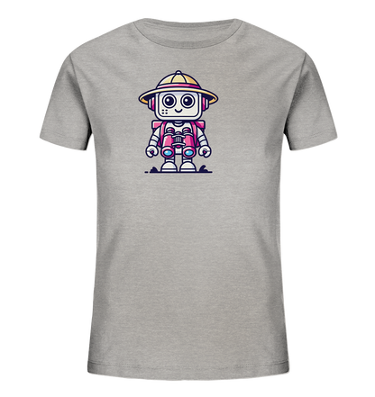 Onlineshop Shirts für Kinder - Das Bild zeigt ein graues T-Shirt für Kinder mit einem farbenfrohen Druck auf der Vorderseite. Der Druck stellt einen niedlichen Roboter im Abenteurer-Stil dar, der einen gelben Hut und ein pinkes Outfit mit Ferngläsern trägt. Der Roboter hat ein freundliches Gesicht mit großen Augen und einem Lächeln und steht auf einer kleinen braunen Fläche. Das Design ist verspielt und detailreich, ideal für Kinder, die Roboter und Abenteuer mögen.