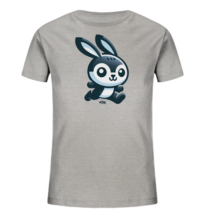 Onlineshop Shirts fuer Kinder - Das Bild zeigt ein graues T-Shirt fuer Kinder mit einem niedlichen Cartoon-Hasenmotiv auf der Vorderseite. Der Hase ist in Schwarz, Weiss und Blautoenen gestaltet und wirkt, als wuerde er springen oder laufen. Er hat grosse Augen und einen freundlichen Ausdruck. Dieses Design verleiht dem Shirt einen verspielten und lebendigen Charakter.