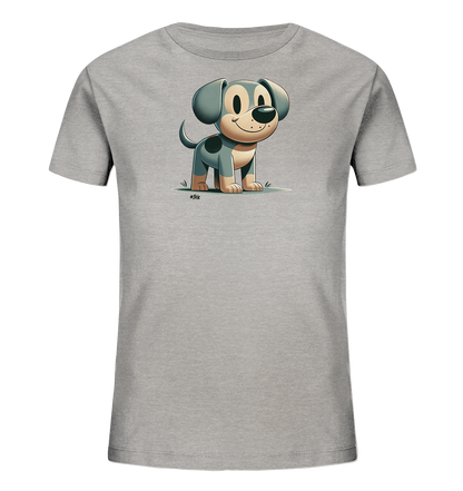 Onlineshop Shirts fuer Kinder - Das Bild zeigt ein graues Kinder-T-Shirt mit einer cartoonhaften Darstellung eines Hundes. Der Hund steht auf einer stilisierten gruenen Flaeche, hat grosse Augen und ein freundliches Laecheln. Das Design umfasst den Hund in grau und beige mit einem dunklen Fleck auf dem Ruecken. Es ist ein einfaches und ansprechendes Motiv fuer Kinderkleidung.
