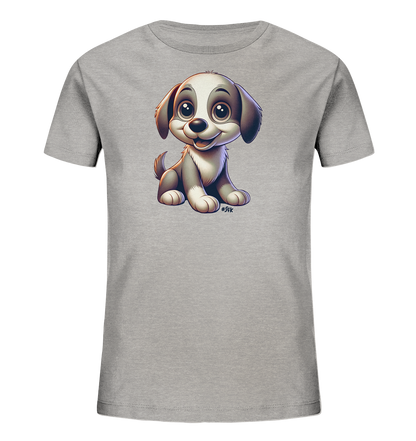 Onlineshop Shirts fuer Kinder - Das Bild zeigt ein graues Kinder-T-Shirt mit einer grossen Grafik auf der Vorderseite. Die Grafik stellt einen cartoonhaften, niedlichen Welpen dar, der aufrecht sitzt. Der Welpe hat grosse Augen, eine froehliche Schnauze und ist in Grautoenen mit weissen Akzenten gehalten. Das Design ist verspielt und kinderfreundlich.