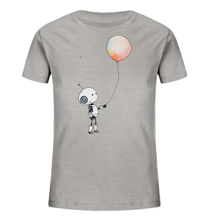 Onlineshop Shirts für Kinder - Das Bild zeigt ein graues Kinder-T-Shirt mit einem Motiv auf der Vorderseite. Zu sehen ist die Illustration eines kleinen, freundlichen Roboters, der einen bunten Ballon an einer Schnur hält. Der Ballon hat eine runde Form und eine Textur, die an Aquarell erinnert, mit Farbtönen wie Orange, Rosa, Gelb und Blau. Der Roboter im Cartoon-Stil hat große Augen und eine Antenne, was dem Design einen verspielten Charakter verleiht.
