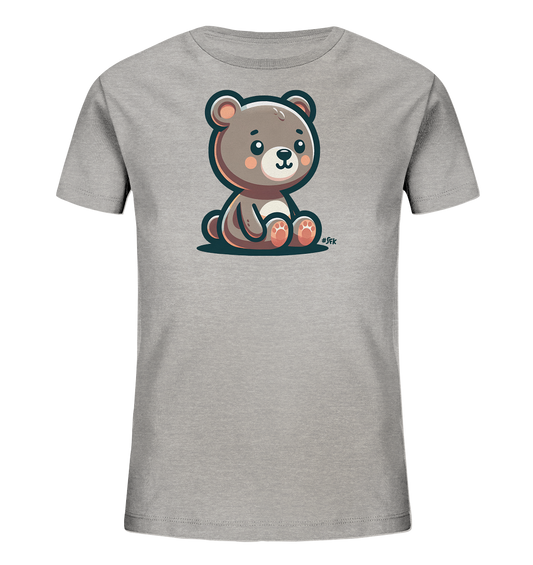Onlineshop Shirts fuer Kinder - Das Bild zeigt ein graues Kinder-T-Shirt mit einem niedlichen Baerenmotiv auf der Vorderseite. Der Baer ist im Cartoon-Stil gezeichnet und sitzt mit grossen Ohren und einem freundlichen Gesichtsausdruck da. Er hat braunes Fell, hellere Pfoten und rosa Wangen, umrandet von einer dunklen Linie. Dieses Design verleiht dem Shirt einen verspielten und ansprechenden Look fuer Kinder.