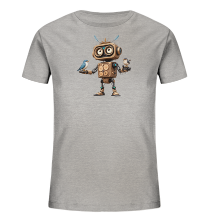 Onlineshop Shirts für Kinder - Dieses Bild zeigt ein graues Kinder-T-Shirt, auf dem ein freundlich aussehender Roboter abgebildet ist. Der Roboter, der aus verschiedenen Elementen wie Holz und Metall zu bestehen scheint, hält auf jeder Hand einen kleinen Vogel. Die Vögel sind farbig, einer bläulich und der andere bräunlich, und sitzen auf den Händen des Roboters. Das Motiv ist zentral auf der Vorderseite des Shirts platziert und wirkt detailreich.