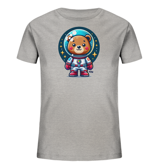 Onlineshop Shirts fuer Kinder - Das Bild zeigt ein graues Kinder-T-Shirt mit einem niedlichen Motiv eines Cartoon-Baeren im Astronautenanzug. Der Baer traegt einen weissen Anzug mit Helm und steht vor einem dunklen, sternenuebersaeten Kreis, der den Weltraum darstellt. Das Design ist farbenfroh und detailliert, mit Akzenten in Rot und Blau. Der Baer blickt freundlich nach vorne.