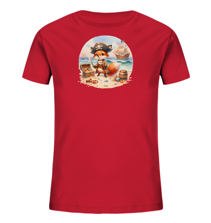 Onlineshop Shirts fuer Kinder - Das rote T-Shirt fuer Kinder zeigt eine niedliche Illustration eines Piratenfuchses. Der Fuchs steht an einem Strand mit einem Schwert in der Hand, umgeben von einer Schatzkiste und einem Fass. Im Hintergrund sind das Meer und ein Segelschiff zu sehen. Das Design wirkt verspielt und abenteuerlich.