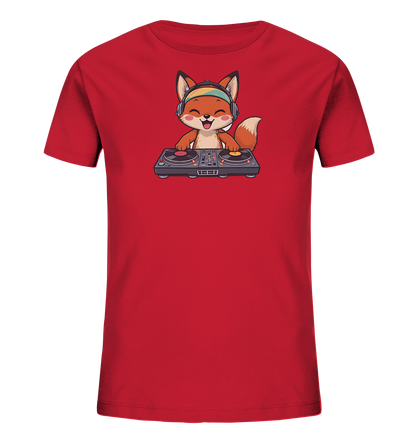 Onlineshop Shirts fuer Kinder - Das Bild zeigt ein rotes Kinder-T-Shirt mit einem niedlichen Cartoon-Fuchs. Der Fuchs traegt Kopfhoerer und steht vor einem DJ-Mischpult, dabei lacht er froehlich mit geschlossenen Augen. Das Design ist verspielt und farbenfroh, ideal fuer musikbegeisterte Kinder.