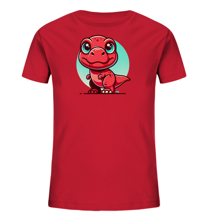 Onlineshop Shirts für Kinder - Das Bild zeigt ein leuchtend rotes T-Shirt für Kinder, das auf der Vorderseite mit einer niedlichen Grafik bedruckt ist. Im Zentrum des Designs befindet sich ein kleiner, roter Cartoon-Dinosaurier mit großen blauen Augen und einem freundlichen Lächeln. Der Dino steht auf einer schwarzen Linie vor einem hellblauen Kreis, der als Hintergrund dient. Die Illustration ist klar und farbenfroh, was das T-Shirt zu einem attraktiven Kleidungsstück für Kinder macht.