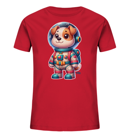 Onlineshop Shirts fuer Kinder - Das Bild zeigt ein rotes T-Shirt mit einem Druck eines niedlichen Cartoon-Hundes in einem detaillierten Astronautenanzug. Der Hund hat braun-weisses Fell und traegt einen weissen Anzug mit blauen, roten und gelben Akzenten sowie einen transparenten Helm und Kopfhoerer. Das Design ist farbenfroh und spricht kleine Weltraumfans an.
