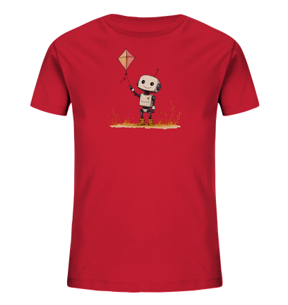 Onlineshop Shirts für Kinder - Das Bild zeigt ein leuchtend rotes T-Shirt für Kinder. Auf der Vorderseite ist eine niedliche Illustration eines kleinen, freundlich aussehenden Roboters abgebildet. Der Roboter steht auf einem Stück Boden mit einigen Grashalmen und hält einen gelben Drachen an einer Schnur fest. Das Motiv ist farbenfroh und wirkt verspielt und fröhlich.