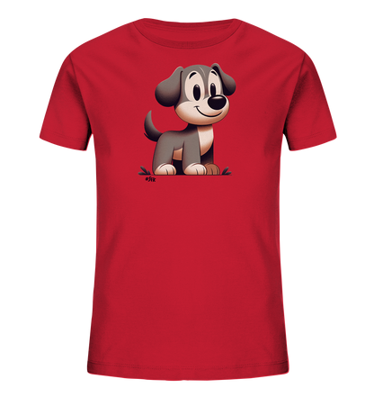 Onlineshop Shirts fuer Kinder - Das Bild zeigt ein rotes Kinder-T-Shirt mit einer freundlichen, cartoonartigen Hundegrafik auf der Vorderseite. Der Hund hat graubraunes Fell, grosse Augen und ein breites Laecheln. Er sitzt auf einer angedeuteten gruenen Flaeche, die an Gras erinnert. Das Design wirkt froehlich und verspielt.