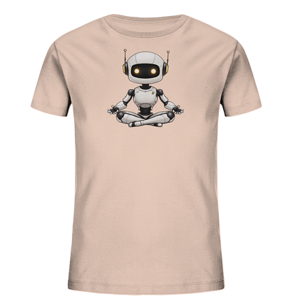 Onlineshop Shirts für Kinder - Das Bild präsentiert ein hellrosafarbenes T-Shirt für Kinder, dessen Vorderseite von einem niedlichen Motiv dominiert wird. Zu sehen ist ein kleiner, cartoonhafter Roboter, der im Lotussitz (Meditationshaltung) dargestellt ist. Der Roboter hat große, leuchtende Augen und Antennen, was ihm ein freundliches Aussehen verleiht. Dieses Design wirkt ruhig und originell und ist eine schöne Option für Kinder, die Technologie oder Achtsamkeit mögen.