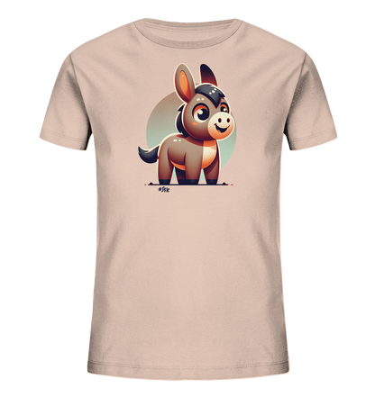 Onlineshop Shirts fuer Kinder - Das Bild zeigt ein helles, beigefarbenes Kinder-T-Shirt. Auf der Vorderseite ist eine suesse, cartoonhafte Illustration eines Esels zu sehen. Der Esel ist braun und grau dargestellt, hat grosse Augen und ein freundliches Laecheln. Hinter ihm befindet sich ein dezenter, kreisfoermiger Hintergrund.