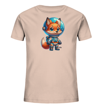Onlineshop Shirts fuer Kinder - Das Bild zeigt ein beiges T-Shirt fuer Kinder. Auf der Vorderseite ist ein niedlicher Cartoon-Fuchs in einem blauen und grauen Astronautenanzug abgebildet. Der Fuchs traegt einen Helm, durch den Sterne und Planeten sichtbar sind, und hat einen freundlichen Ausdruck. Das verspielte Design ist ideal fuer kleine Weltraum-Fans.