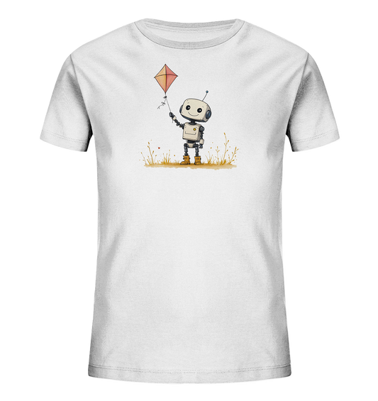 Onlineshop Shirts für Kinder - Das Bild zeigt ein weißes Kinder-T-Shirt mit einem freundlichen Roboter als Motiv. Der Roboter, mit großen Augen und einem Lächeln, hält einen orangefarbenen Drachen an einer Schnur in seiner rechten Hand. Das Motiv ist in einem Comic-Stil gezeichnet und zeigt den Roboter auf einer angedeuteten Wiese mit einigen Grashalmen. Die Illustration ist farbenfroh und strahlt eine fröhliche Atmosphäre aus, passend für ein Kinder-T-Shirt.
