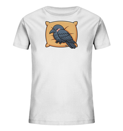 Onlineshop Shirts fuer Kinder - Das Bild zeigt ein weisses Kinder-T-Shirt mit einer niedlichen Illustration eines schlafenden Vogels. Der dunkelgraue Vogel liegt friedlich auf einem hellbraunen Kissen und scheint tief zu schlafen. Mit geschlossenen Augen und leicht geroeteten Wangen strahlt das Motiv Ruhe und Gemuetlichkeit aus. Das verspielte Design ist ideal fuer kleine Schlafmuetzen.
