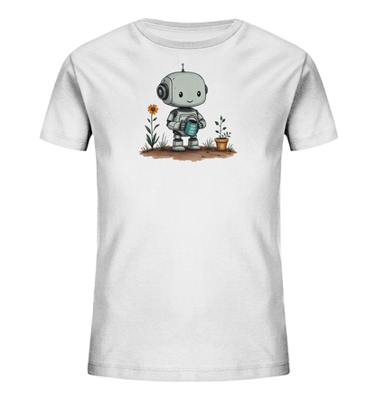 Onlineshop Shirts für Kinder - Das Bild zeigt ein weißes Kinder-T-Shirt mit einem Aufdruck auf der Vorderseite. Der Aufdruck stellt einen niedlichen, grau-blauen Roboter dar, der eine Gießkanne hält. Der Roboter steht auf brauner Erde neben einer Blume und einer kleinen Pflanze im Topf. Die Szene zeigt den Roboter beim Gärtnern und hat einen freundlichen, verspielten Charakter, der gut für Kinder geeignet ist.