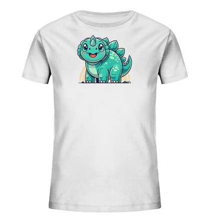 Onlineshop Shirts fuer Kinder - Das Bild zeigt ein weisses T-Shirt fuer Kinder mit einer zentralen Grafik auf der Vorderseite. Diese zeigt einen niedlichen Cartoon-Dinosaurier in tuerkis und blau. Der kleine Dino hat ein freundliches Laecheln, grosse Kulleraugen sowie Stacheln auf dem Ruecken und ein Horn auf der Nase. Das verspielte Motiv ist von hellen Strichen umgeben und verleiht dem Shirt einen froehlichen Look.